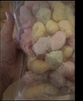 Finished freeze-dried sour gummy worms in a clear bag