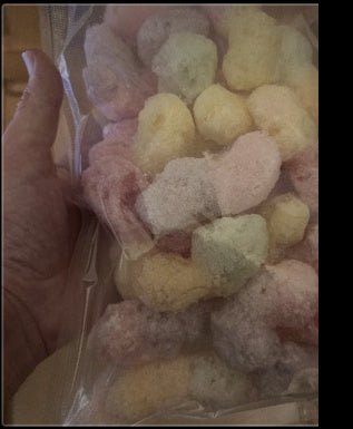 Finished freeze-dried sour gummy worms in a clear bag