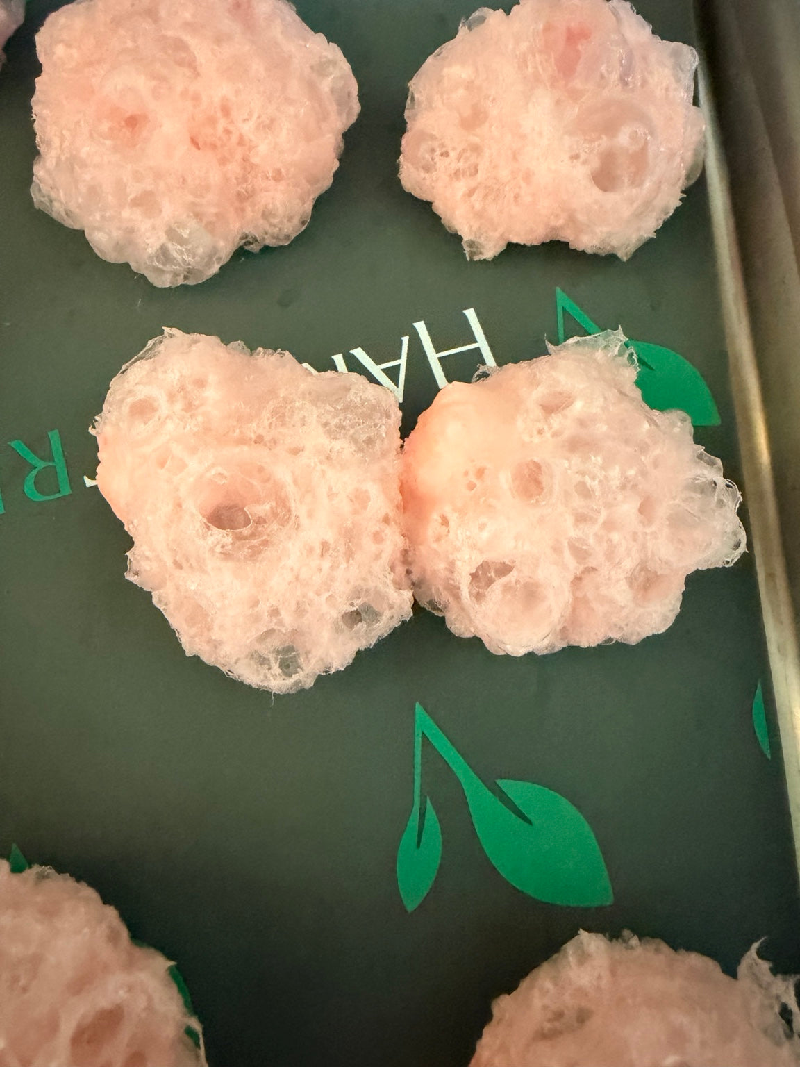 Close-up of airy pink freeze-dried watermelon clouds