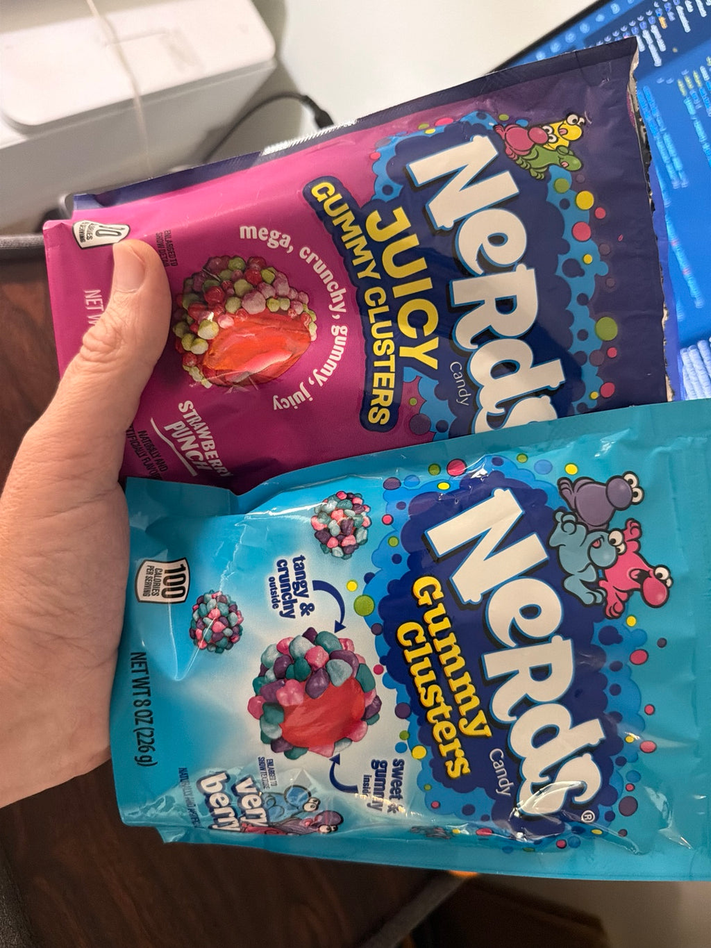 Strawberry Punch and Very Berry Nerds Gummy Clusters packages